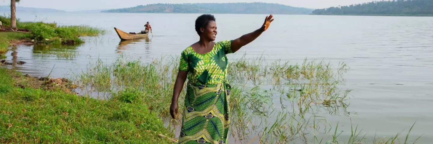Jeanne standing by lake Cyohoha, in Rwanda