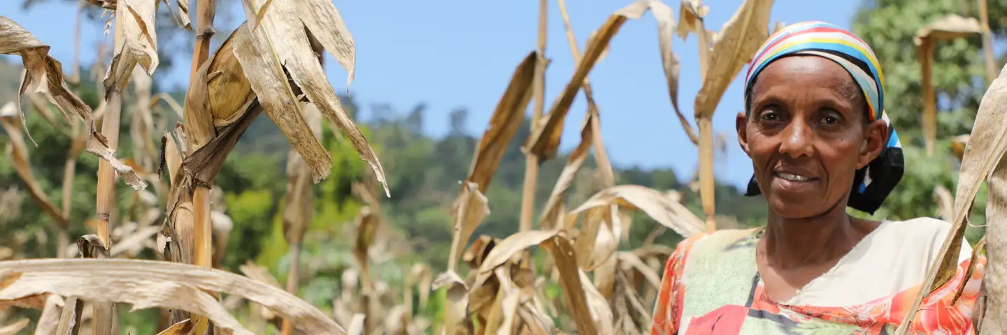 A woman in her crop field