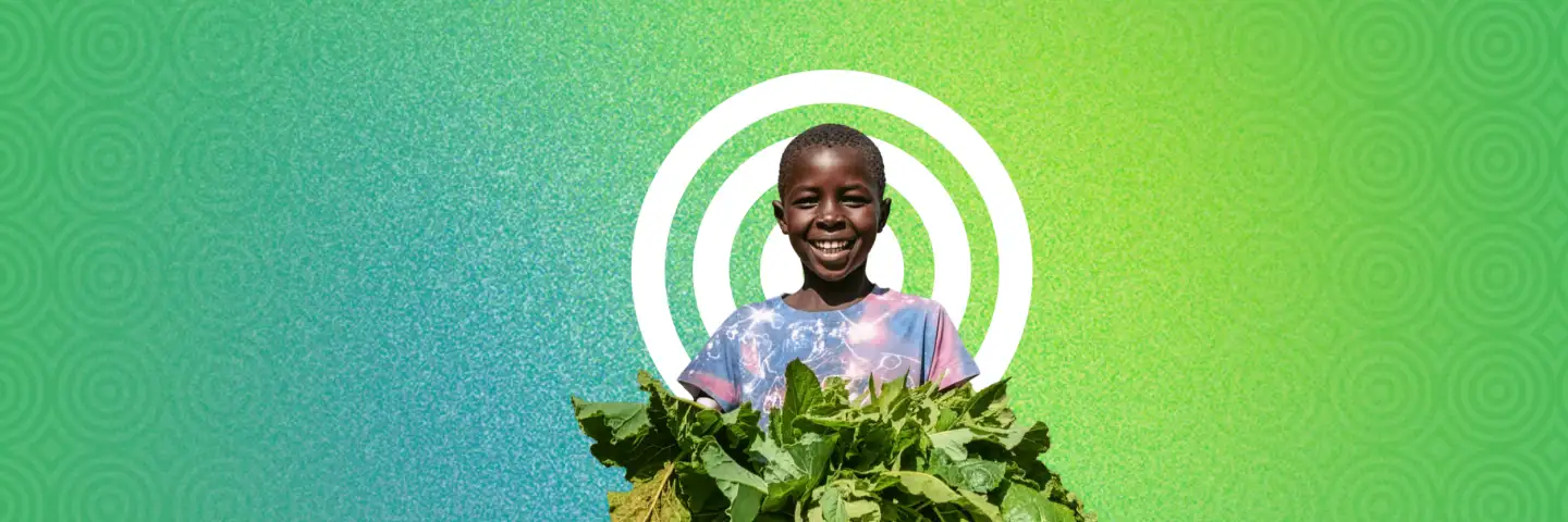 A young girl is smiling, holding leafy greens. On a green graphic background with a 'The original charity catalogue' bookmark top right.