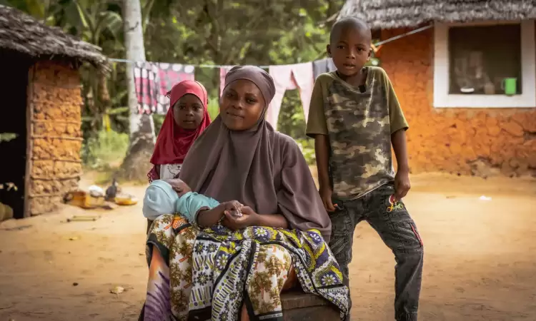 Fatuma, Ripple Effect project participant, and her three children - Kenya