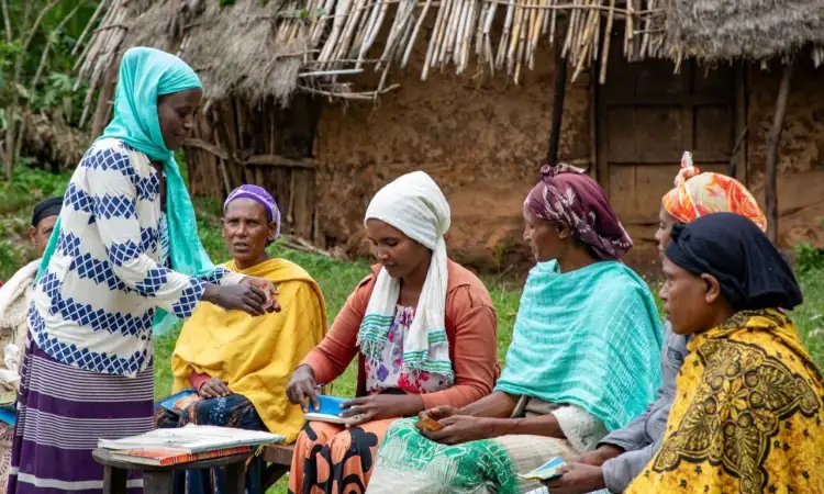 Women sitting together sharing knowledge with eachother