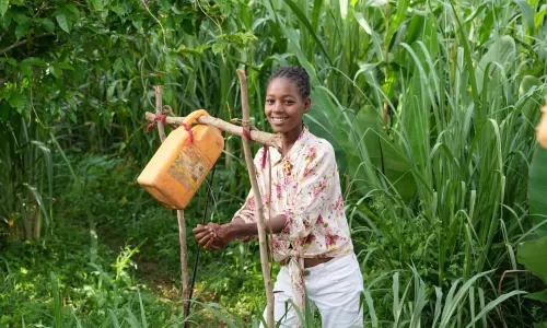 Hygiene and sanitation in Ethiopia - Zenebech using a tip tap to wash her hands
