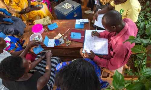 Community group meeting about savings