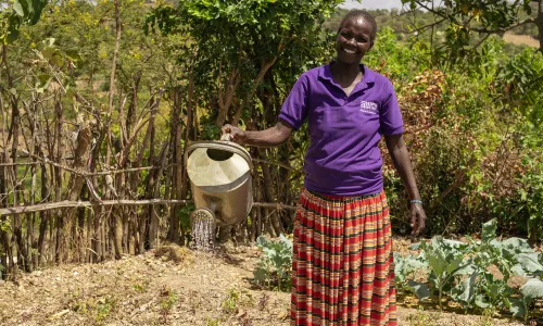 Woman watering plants
