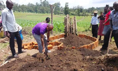 Community members sharing farming knowledge