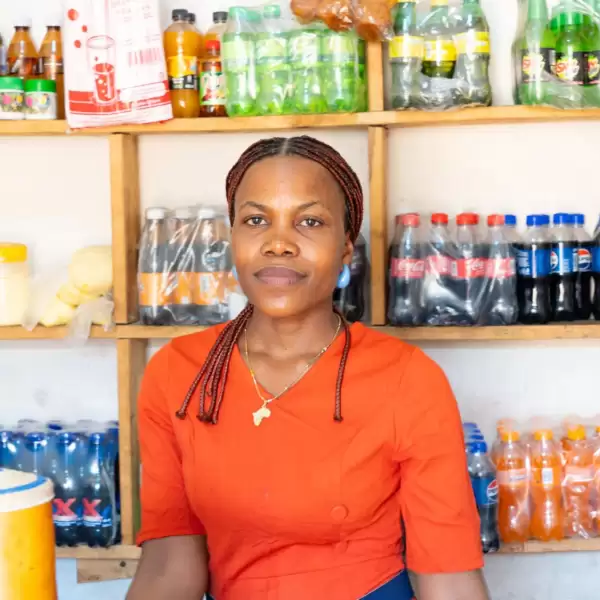 Patience, a Ugandan woman, at her shop