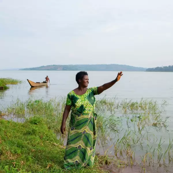 Jeanne standing by lake Cyohoha, in Rwanda