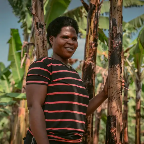 Edith, a Ugandan farmer, with her banana plantation