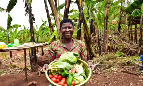 Therese holding vegetables