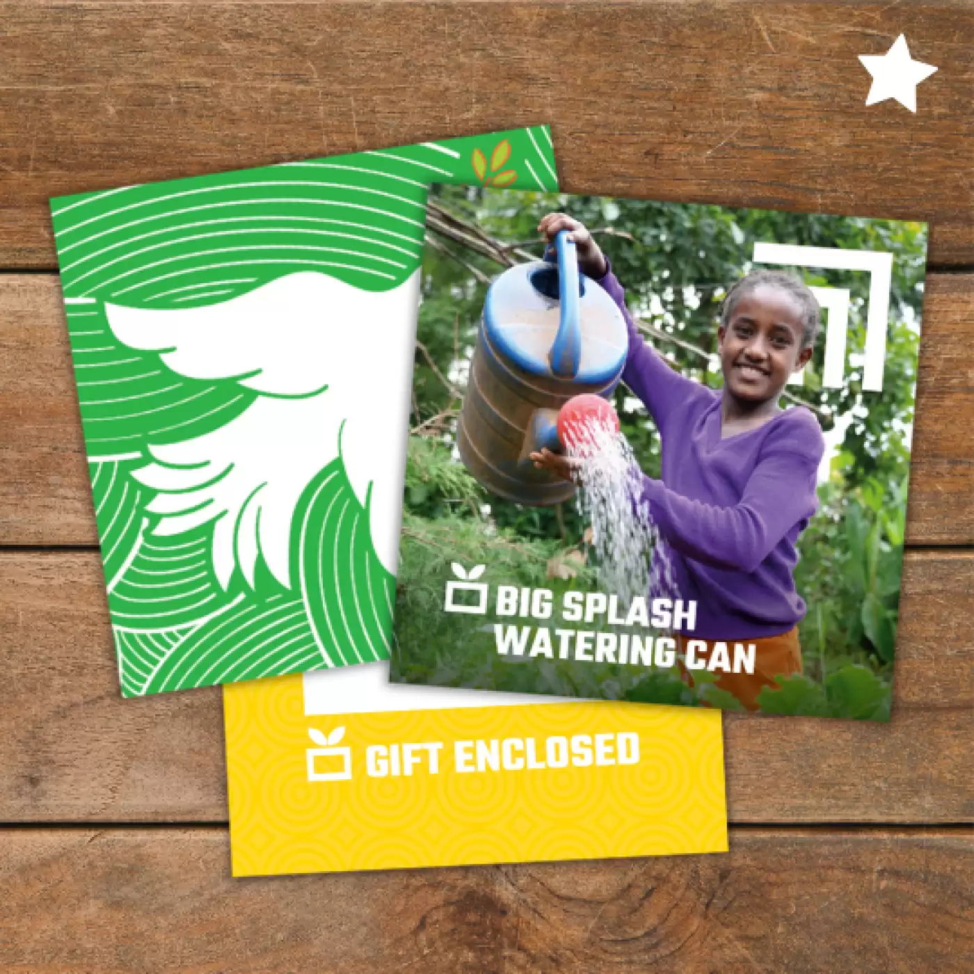 Flat lay of Big Splash Watering Can gift pack